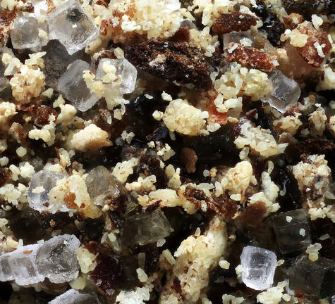 Potassium bitartrate, Cream of Tartar buildup on Wine Cork after bottling.  Otherwise called Wine Diamonds.