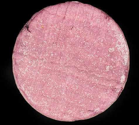 Potassium bitartrate, Cream of Tartar buildup on Wine Cork after bottling.  Otherwise called Wine Diamonds.