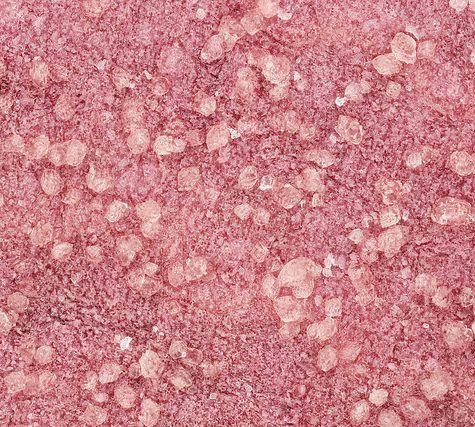 Potassium bitartrate, Cream of Tartar buildup on Wine Cork after bottling.  Otherwise called Wine Diamonds.